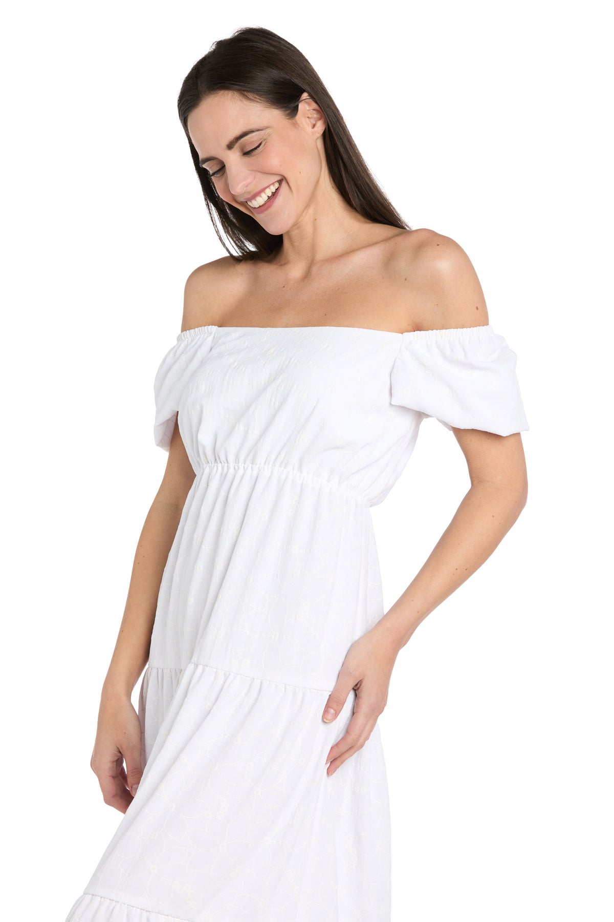 A woman smiles and looks down while wearing the R&M Richards 6669 Tea-Length White Party Dress, set against a plain white background.